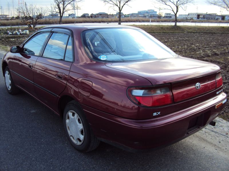 Carina отзывы. Toyota Carina улыбка.